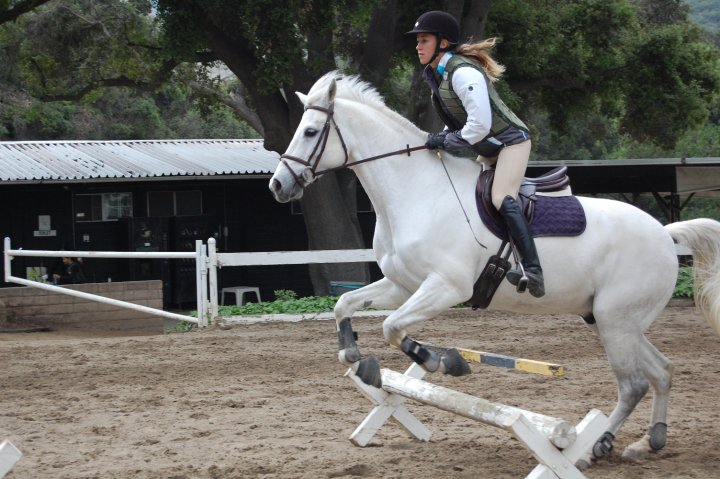 Laura horseback riding.